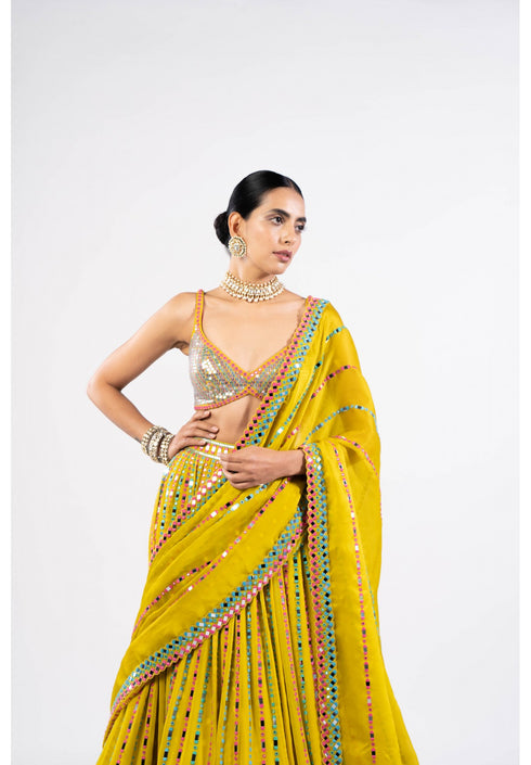 Moss Green Linear Drop Lehenga With Metallic Blouse.