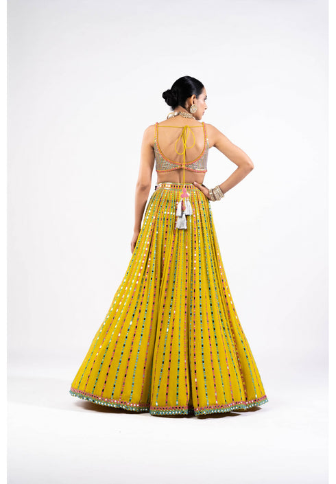 Moss Green Linear Drop Lehenga With Metallic Blouse.