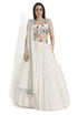 Ivory Embroidered Choli And Ruffle Lehenga With Dupatta