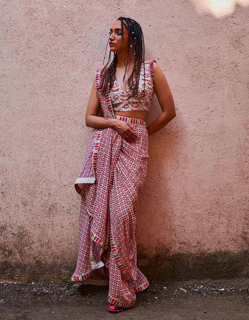 Ivory Geometric Print Pre Stitched Cascase Saree Teamed With An Embellished Bustier