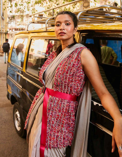 Concrete Grey Pre Stitched Cascase Saree Teamed With Bustier And Embellished Jacket