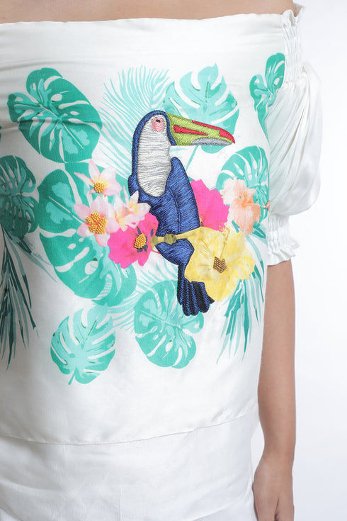 Toucan printed with highlighting embroidery detailing off-shoulder top with layered trousers
