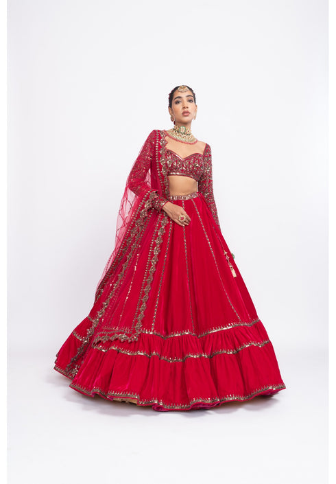 Red double tier lehenga set