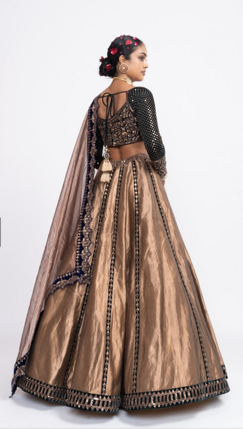 Deep green copper tissue lehenga set